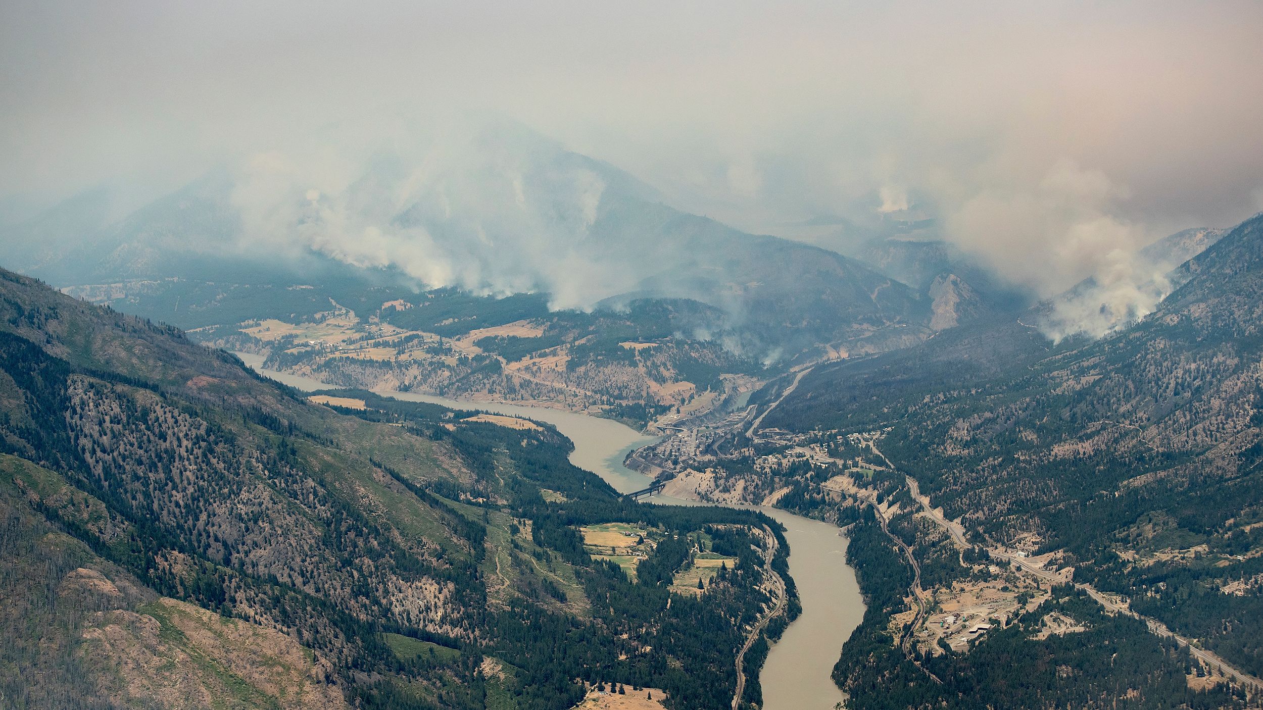 An aerial photo taken from a helicopter shows a wildfire burning in the mountains north of Lytton, British Columbia on July 1.  