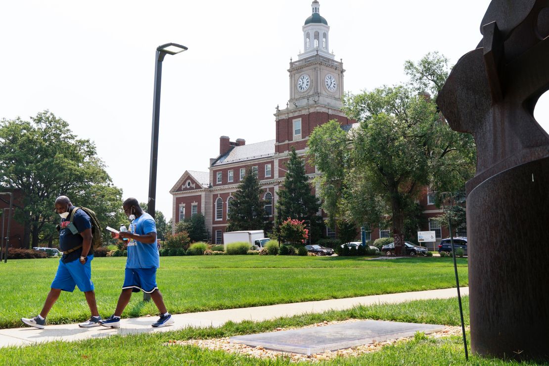 People walk through the Howard University campus, past the Founders Library. "Nikole Hannah-Jones helps to increase Howard's prestige," one alumna said.