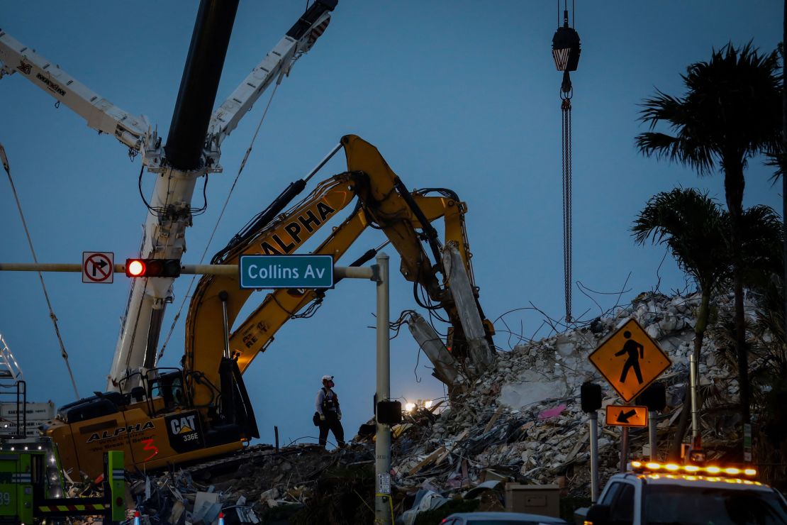 Teams continue to work in the rubble at the site of the collapsed Champlain Towers South condo in Surfside.