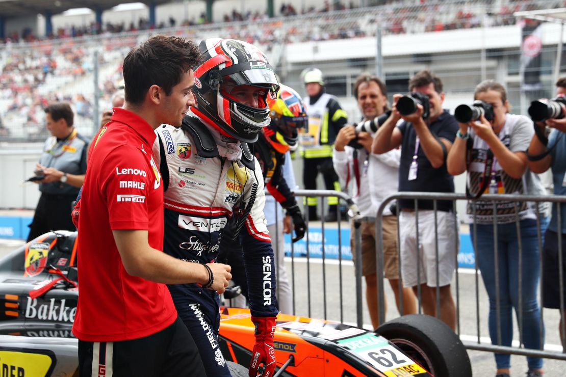 Charles Leclerc celebrates after his brother, Arthur Leclerc, won the F4 race before the F1 Grand Prix of Germany at Hockenheimring on July 28, 2019 in Hockenheim, Germany.