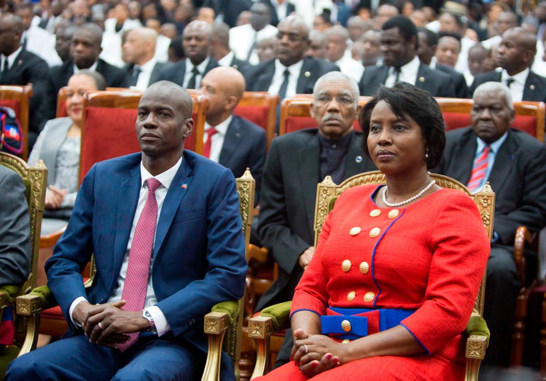 Moise sits with his wife, Martine, during his swearing-in ceremony in Port-au-Prince, Haiti, on February 7, 2017.
