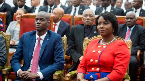 Jovenel Moise sits with his wife Martine during his swearing-in ceremony in Port-au-Prince, Haiti, on February 7, 2017.