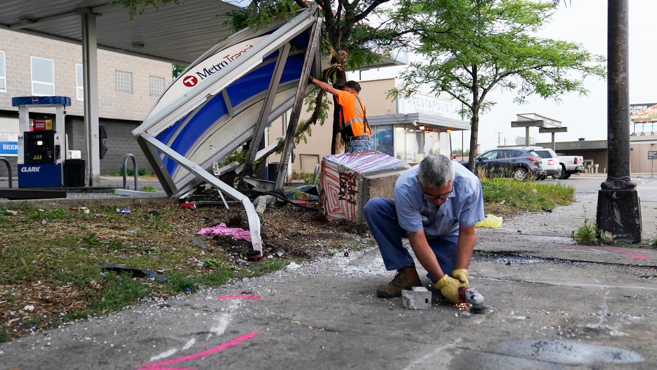 Investigators work at the scene of Tuesday's crash.