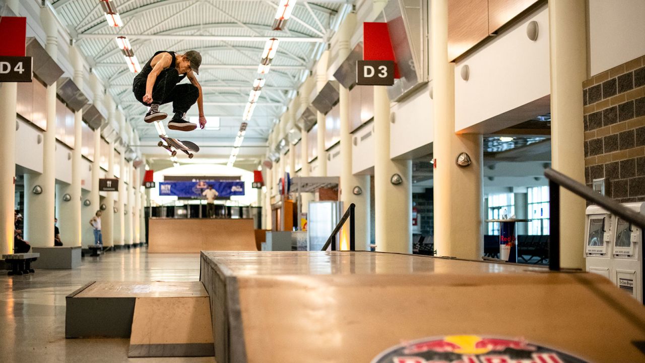 A skater performs a kickflip as part of the Red Bull Terminal Takeover held in May 2021. 