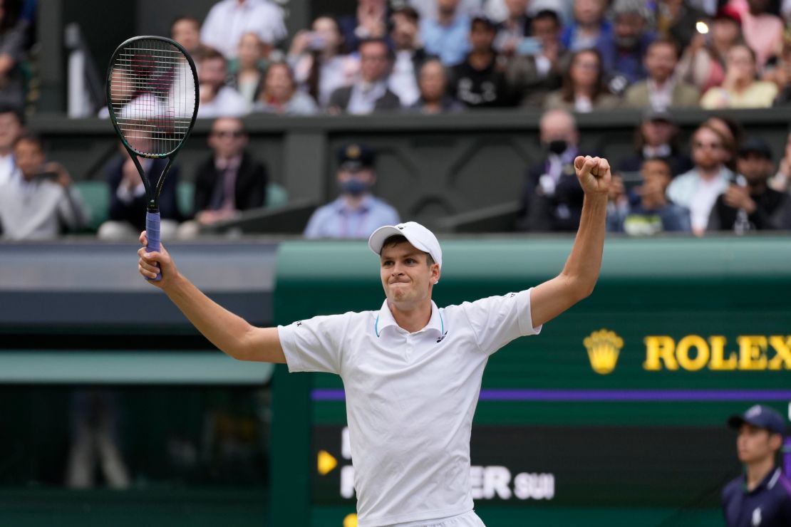 Hubert Hurkacz celebrates after beating Roger Federer to reach the Wimbledon semifinals.