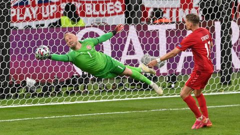 Kasper Schmeichel made some impressive saves to keep Denmark in the tie. 
