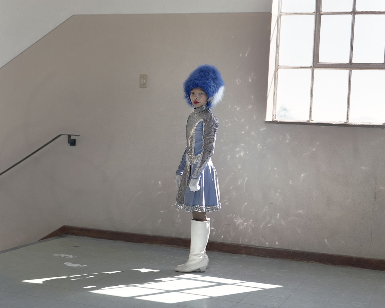 Mann sees the image-making process as a collaboration between subject and artist. She prefers not to direct and instead invites her subjects to choreograph their own portraits. Tanique Williams is a majorette in the Hottentots Holland team, Cape Town, 2018.