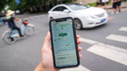 The Didi ride-hailing app on a smartphone arranged in Beijing, China, on Monday, July 5, 2021. 