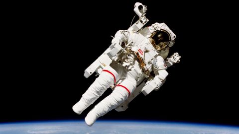 Mission specialist Bruce McCandless II does a historic spacewalk a few meters away from the cabin of the Earth-orbiting Challenger on February 7, 1984.