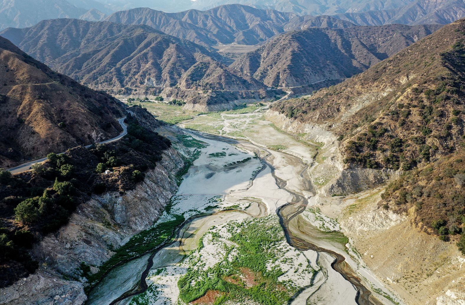 The exposed lake bed of the San Gabriel Reservoir is seen near Azusa, California, in June 2021.