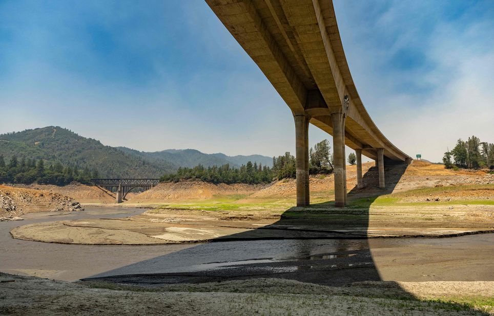 As the Salt Fire burns nearby, a section of the drought-stricken Shasta Lake sits mostly dry in Lakehead, California, on July 2. Firefighters were battling nearly a dozen wildfires in the region.