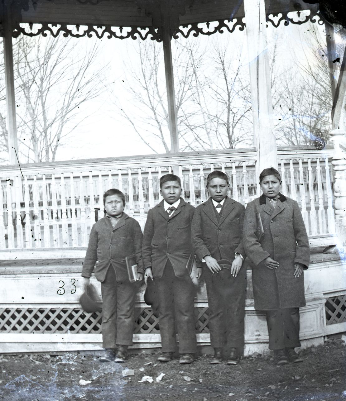 Four boys posing for a photo on the grounds of the Carlisle Indian Industrial School in 1879. Alvan Kills Seven Horses (One That Kills Seven Horses), second from left, was buried there and his remains are among those that will be repatriated to the Rosebud Sioux reservation next week.