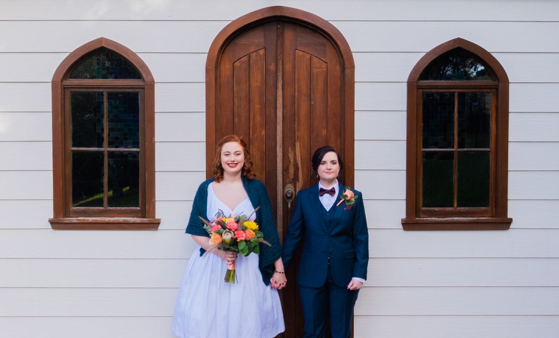 Laura and Sara on their wedding day in April 2021.