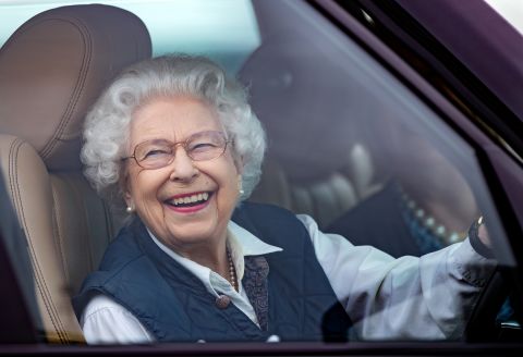 The Queen drives her Range Rover as she attends the Royal Windsor Horse Show in Windsor, England, in July 2021.