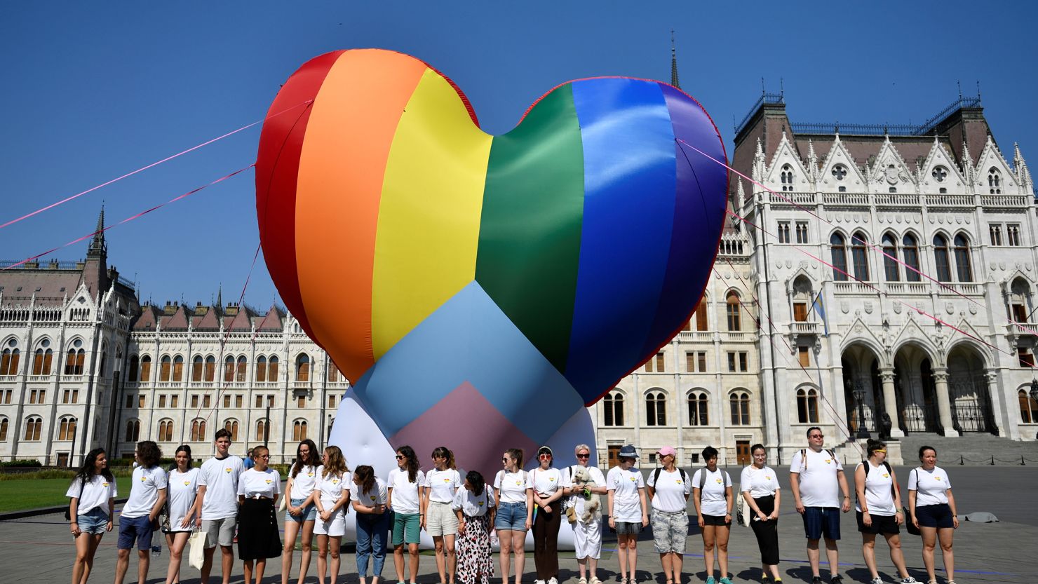 Activists protesting against what they say is an anti-LGBT law gather in front of a rainbow balloon at Hungary's parliament in  in Budapest on Thursday.