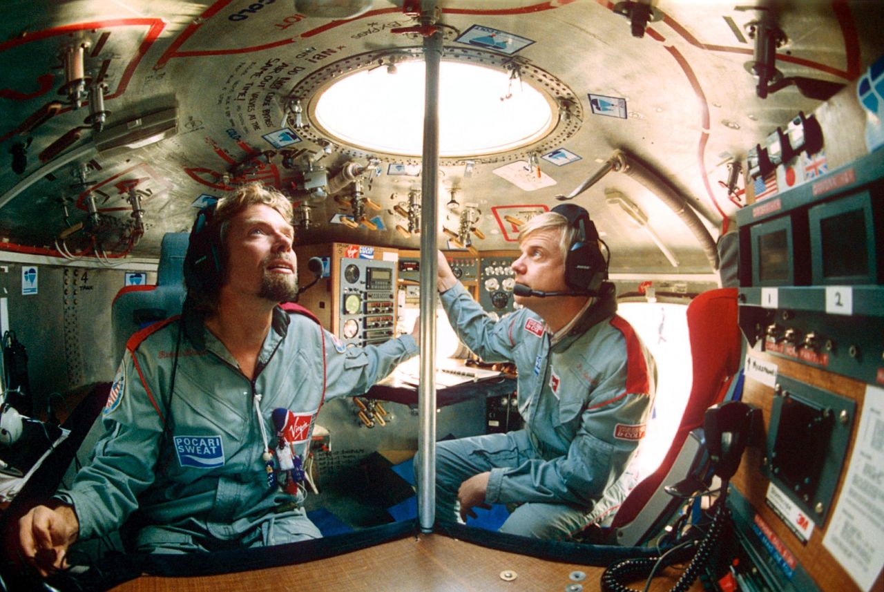 Branson and Per Lindstrand sit in a capsule as they prepare to fly in a hot-air balloon in 1991. In 1987, Branson and Lindstrand became the first people to cross the Atlantic Ocean in a hot-air balloon.