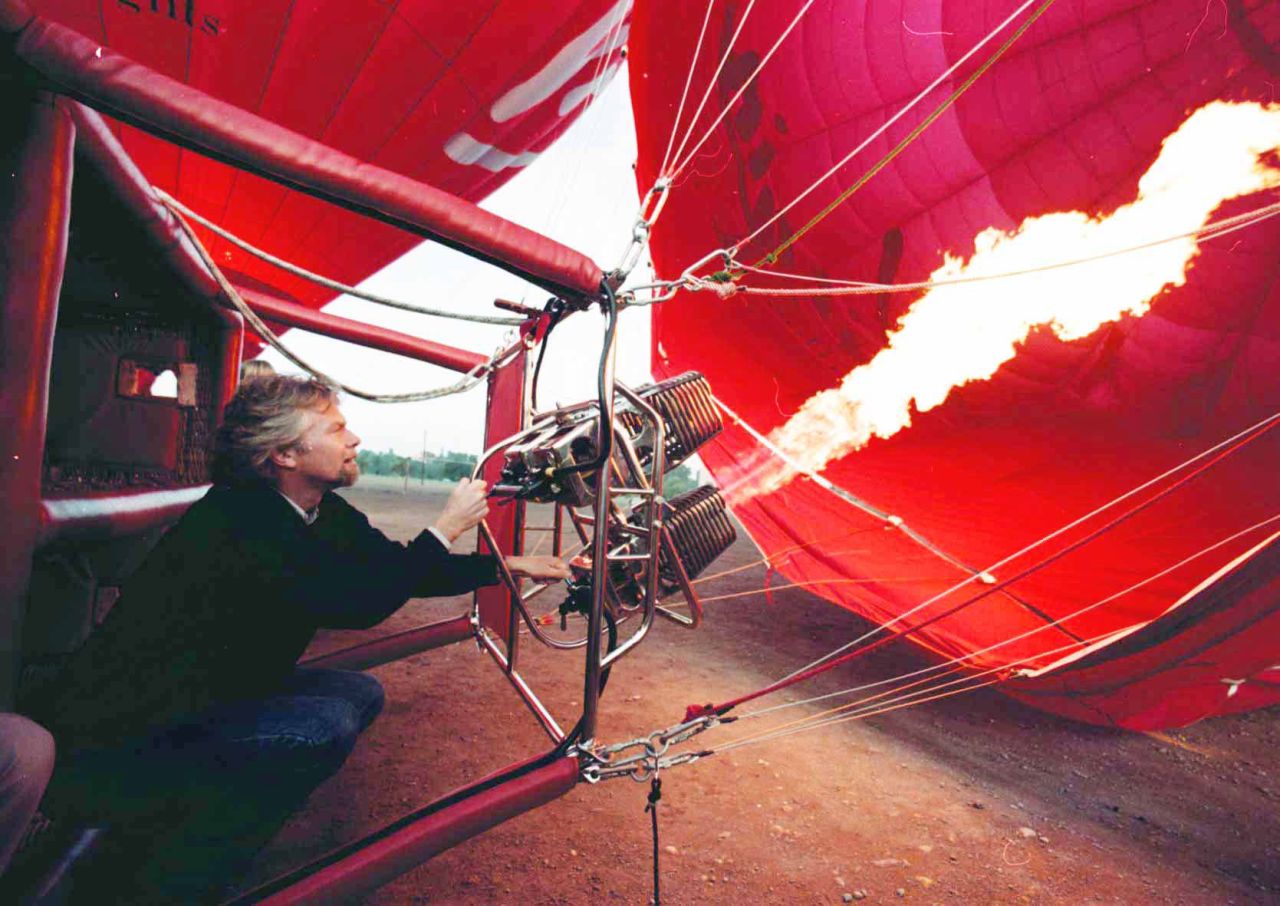 Branson fires up a Virgin balloon outside the city walls of Marrakesh, Morocco, in 1996.