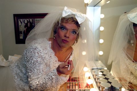 Branson applies makeup before the launch of his Virgin Brides venture in 1996. The business combined weddings and honeymoons in a one-stop shop.