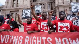 A group joins a rally to support voter rights on the steps of the Texas Capitol, Thursday, July 8, 2021, in Austin, Texas.