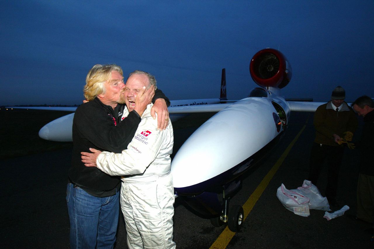 Branson kisses Steve Fossett after Fossett flew the Virgin Atlantic GlobalFlyer for 25,766 miles in 2006. It was the longest nonstop flight in history.