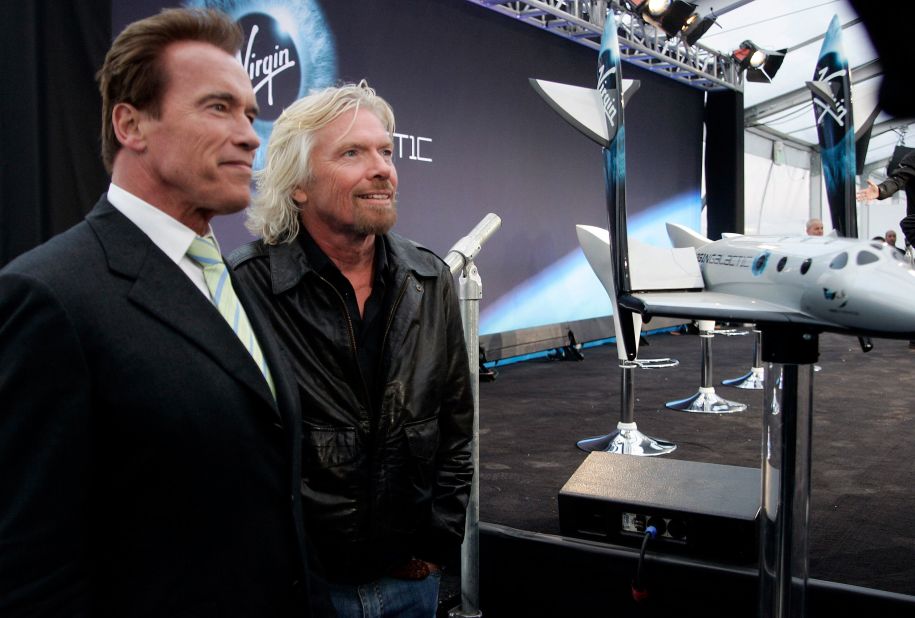 Branson and California Gov. Arnold Schwarzenegger address the media as Virgin Galactic unveiled a commercial spacecraft designed to send passengers into orbit for $200,000 a ticket.