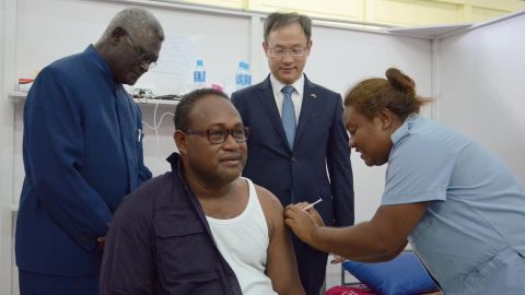 The Solomon Islands Deputy Prime Minister Manasseh Maelanga receives a vaccine provided by China on May 21, 2021. 