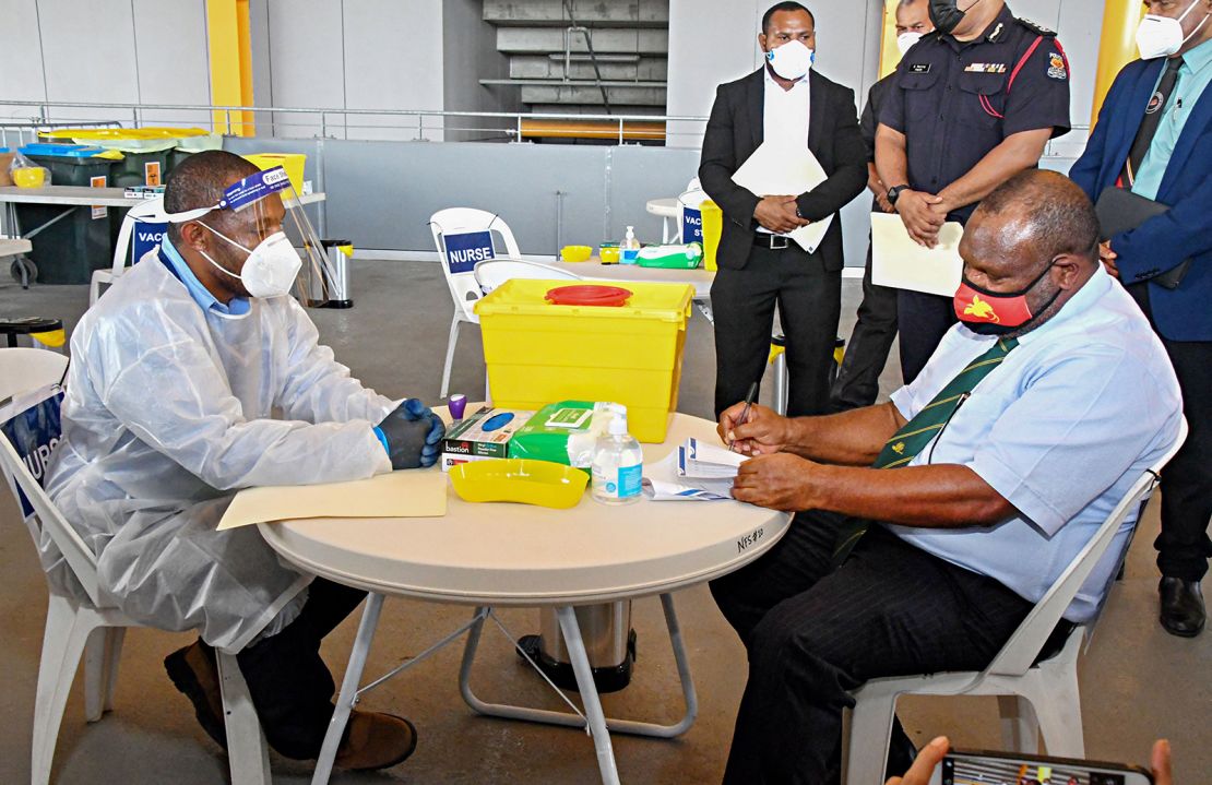 Papua New Guinea's Prime Minister James Marape prepares to receive a dose of the AstraZeneca Covid-19 vaccine in Port Moresby.