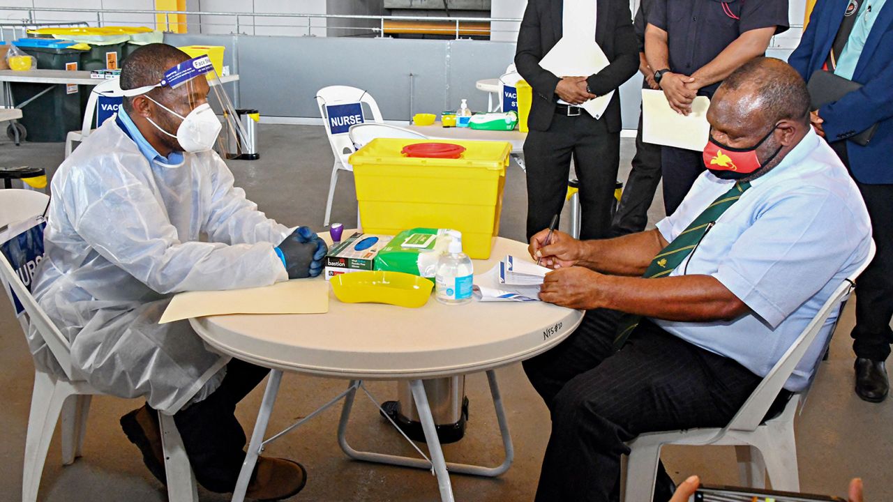 Papua New Guinea's Prime Minister James Marape prepares to receive a dose of the AstraZeneca Covid-19 vaccine in Port Moresby.