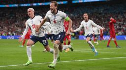 Harry Kane of England is congratulated by Phil Foden after scoring the second goal during the UEFA Euro 2020 Championship Semi-final match between England and Denmark at Wembley Stadium on July 07, 2021 in London, England. 