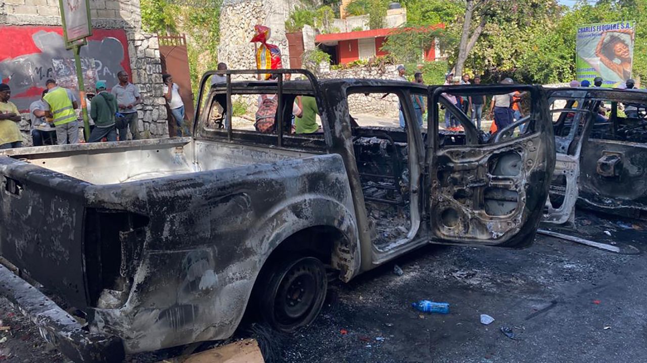 The burned-out remains of cars that belonged to the suspected asassins of Haiti's President on Route de Kenschoff.