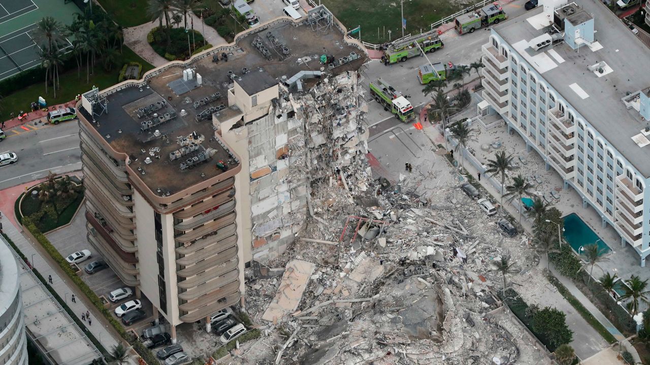 This aerial photo shows part of the oceanfront condo that collapsed early on June 24.
