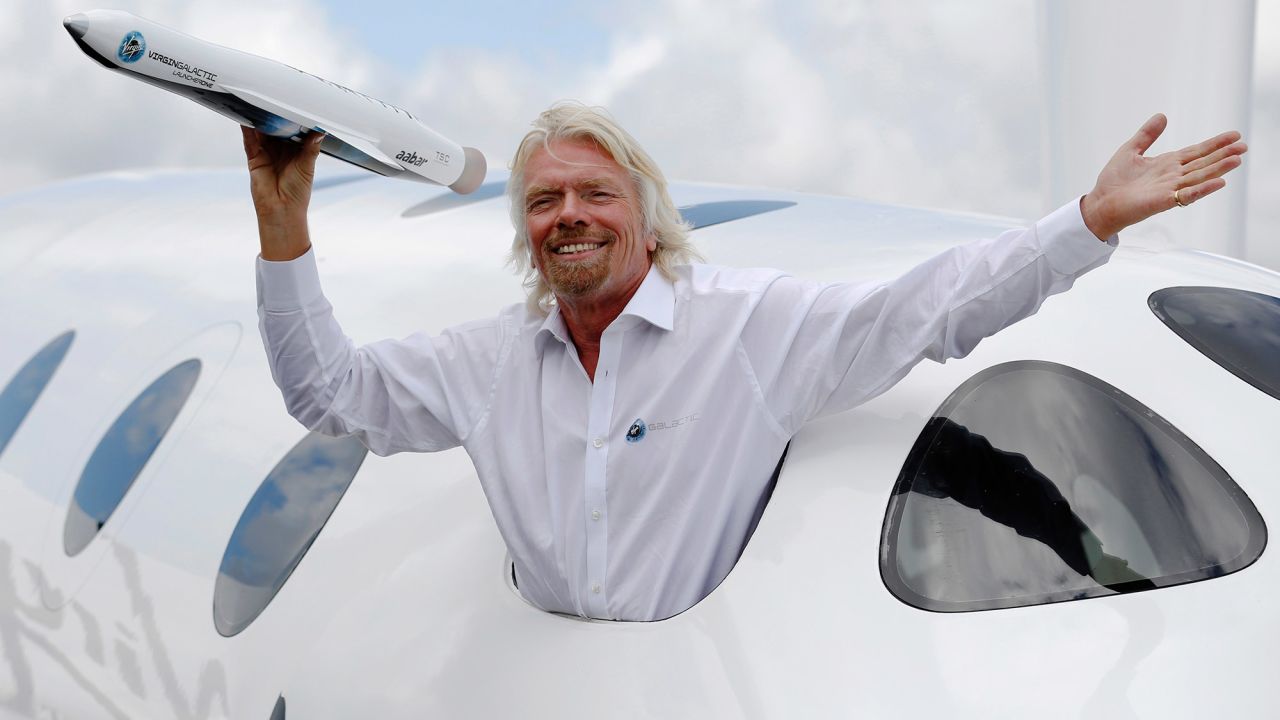 Richard Branson, seen here at an air show in 2012, is a self-made billionaire who has a large conglomerate of businesses under the Virgin brand.