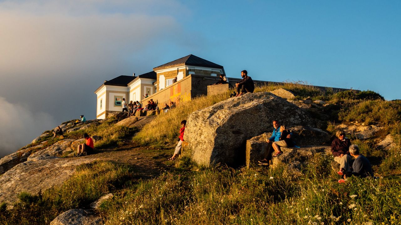 <strong>Finisterre:</strong> Visitors wait for sunset at Cape Finisterre. Finisterre means "Land's End" in Latin.