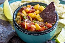 Spice up your summer cookouts with peach salsa. 