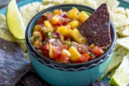 Spice up your summer cookouts with peach salsa.