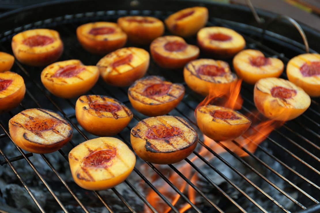 Grill peaches to bring out a sweet and smoky flavor.