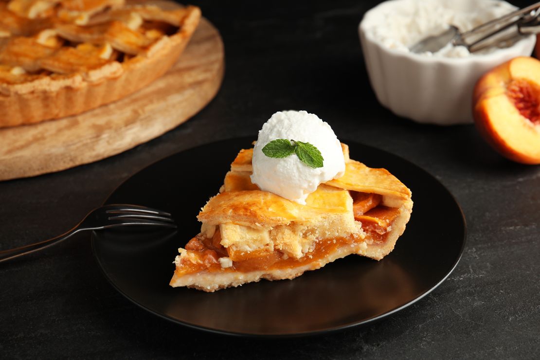 Finish off your meal with peach pie and ice cream.