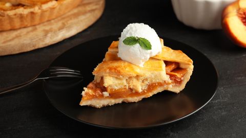 Finish off your meal with peach pie and ice cream.