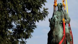 CHARLOTTESVILLE, VIRGINIA - JULY 10: Workers remove a statue of Confederate General Robert E. Lee from Market Street Park July 10, 2021 in Charlottesville, Virginia. Initial plans to remove the statue four years ago sparked the infamous "Unite the Right" rally where 32 year old Heather Heyer was killed. A statue of Confederate General Thomas "Stonewall" Jackson in the Charlottesville and Albemarle County Courthouse Historic District is also scheduled to be removed this weekend.  (Photo by Win McNamee/Getty Images)