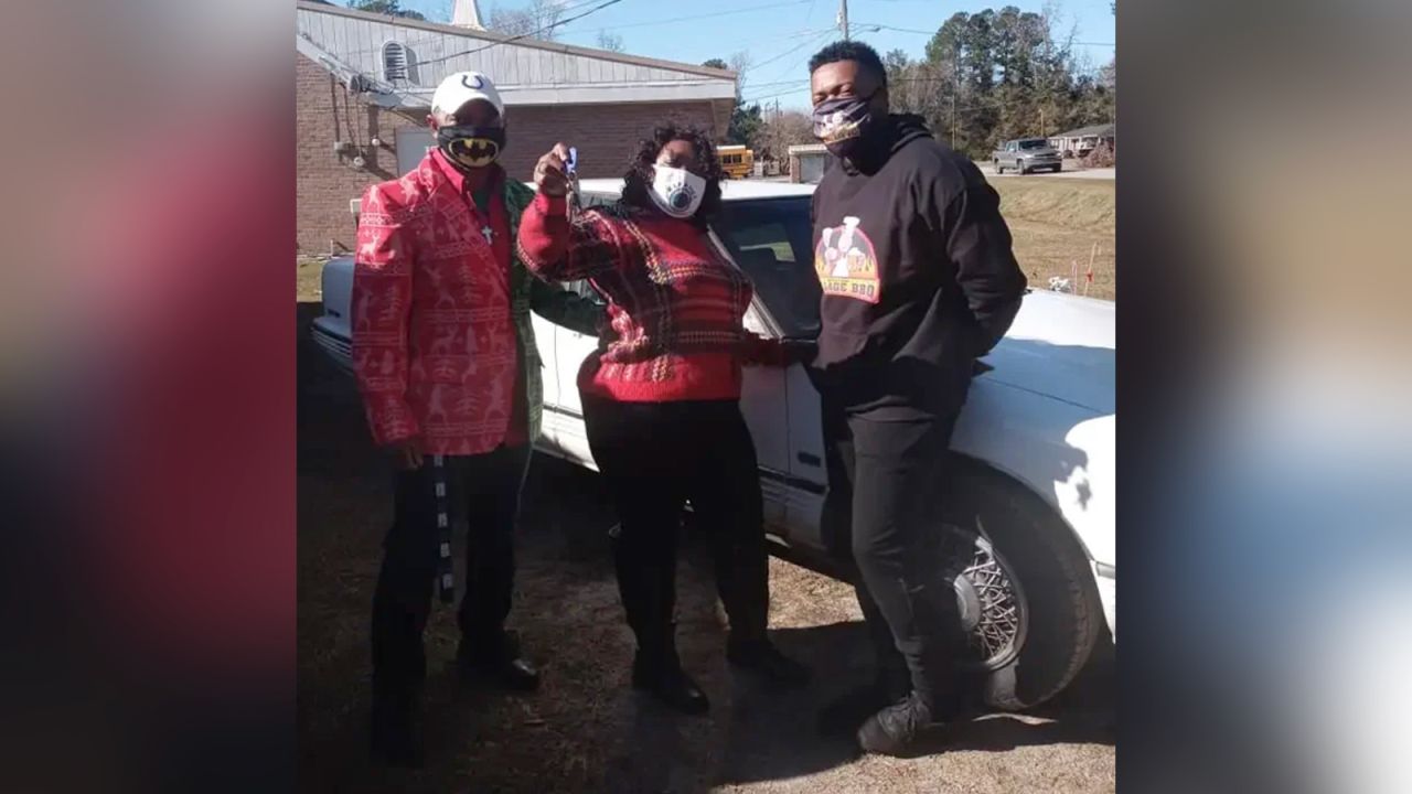 Middleton, right, with Melanie Lee, middle, and her nephew Frank McClary, the mayor of Andrews, South Carolina, after Middleton surprised Lee with a car.