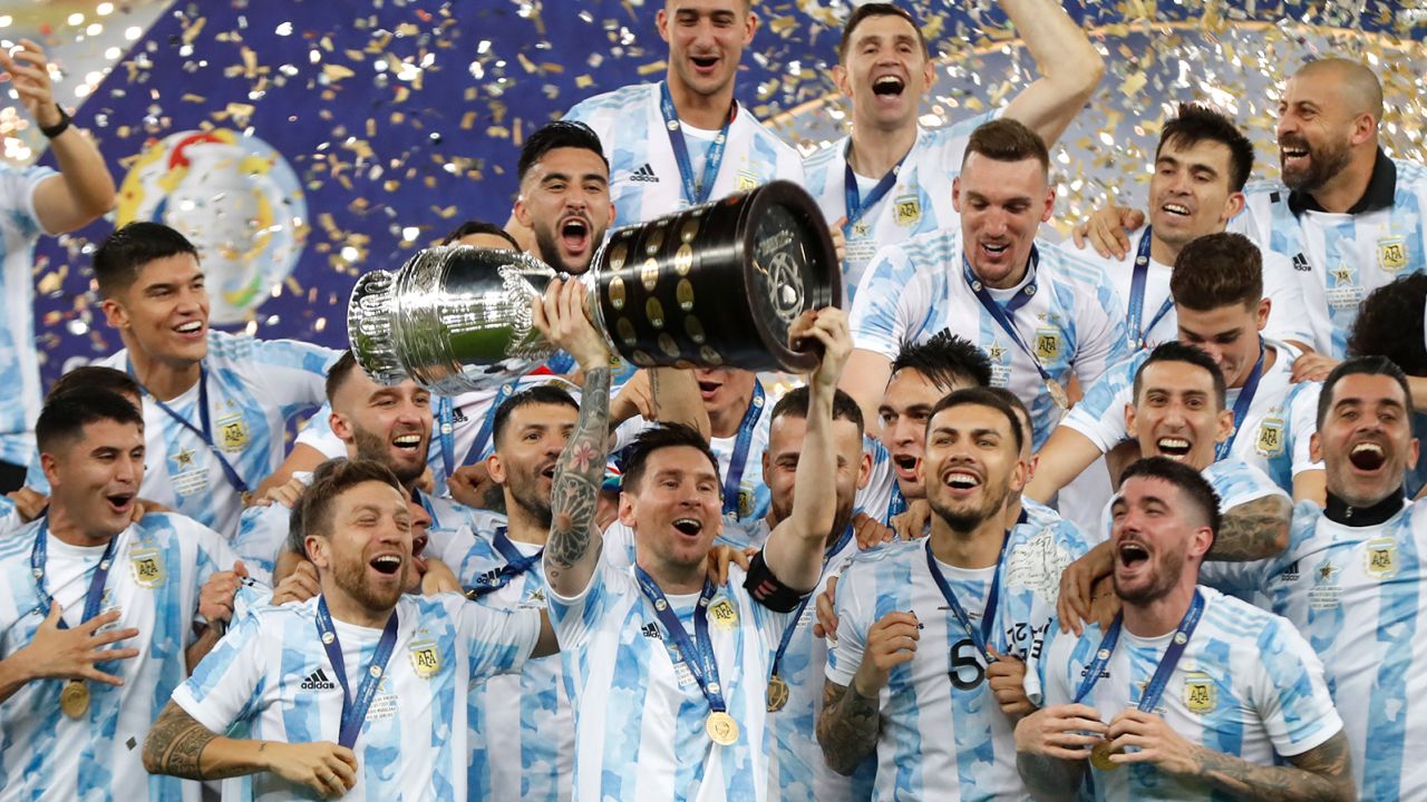 Argentina's Lionel Messi, center, celebrates with teammates after beating Brazil in the Copa America final.