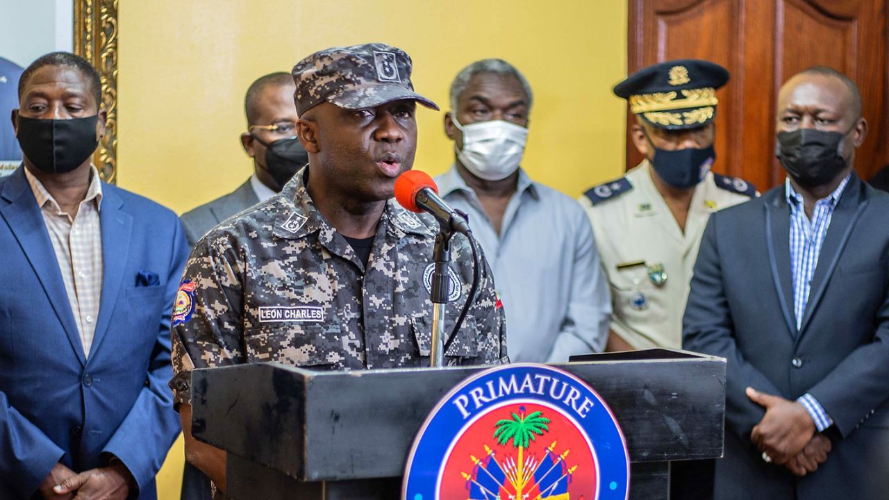 Police General Inspector Leon Charles speaks at a news conference at the Prime Minister's residence July 8.