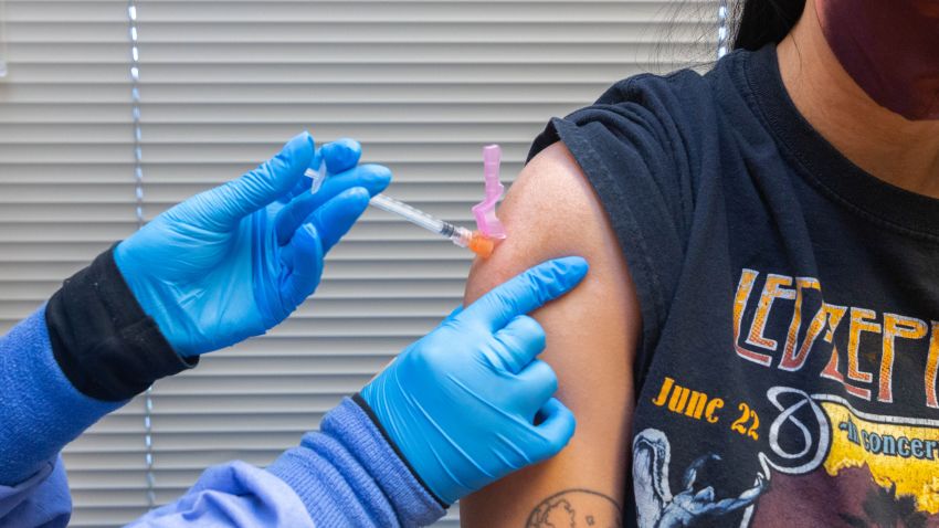 A healthcare worker administers a dose of the Pfizer-BioNTech Covid-19 vaccine to a resident at the Jordan Valley Community Health Center in Springfield, Missouri on Tuesday, in this June 29, 2021 file photo.