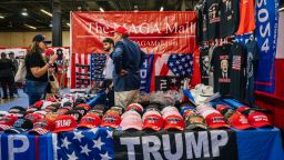 DALLAS, TEXAS - JULY 10: People view merchandise during the Conservative Political Action Conference CPAC held at the Hilton Anatole on July 10, 2021 in Dallas, Texas. 
