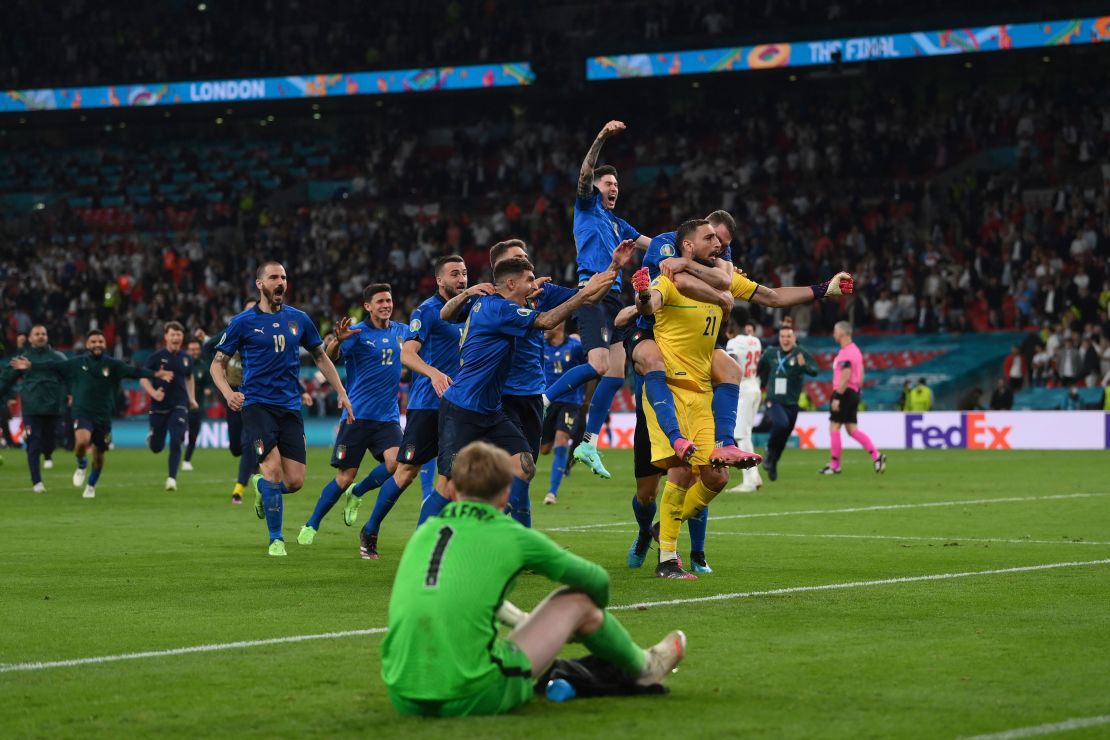 Italian players celebrate after the penalty shootout against England.
