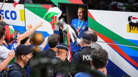 Chiellini exits the bus as the team arrives at the Parco dei Principi hotel after winning the European Championship.