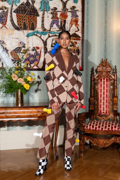 Chessboards got a colorful twist at the show, with one model sporting a brown and tan checkerboard suit.