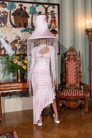 Pyer Moss paid homage to the electric lamp, designing an elaborate lampshade headdress fringed with crystals.