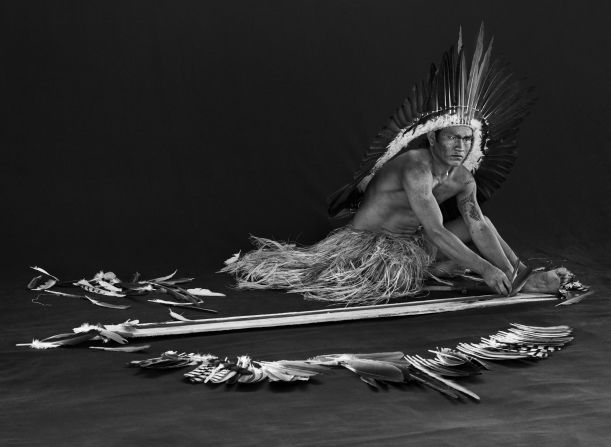 In Rio Gregório Indigenous Territory, Acre state, 2016, Miró (Viná) Yawanawá of the Yawanawá people crafts with feathers. Salgado writes that in 1970 there were thought to be only 120 members of the Yawanawá people, but today the population has grown to 1,200.