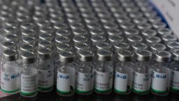 Empty vials of the Sinopharm COVID-19 vaccine sit in a tray during a vaccination campaign for people over 40 at the public University San Andres, in La Paz, Bolivia, Wednesday, June 16, 2021. (AP Photo/Juan Karita)